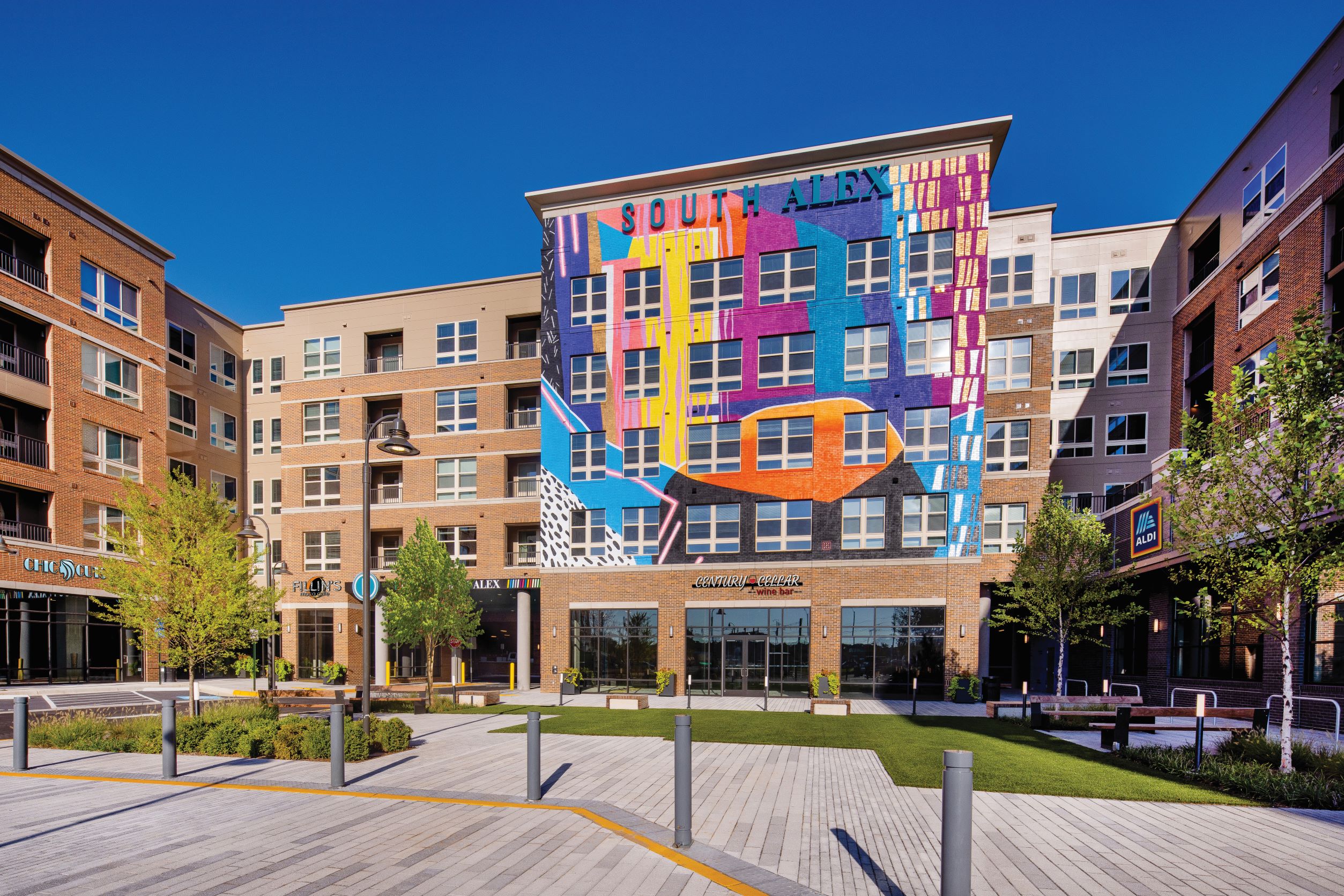 5 story building exterior with mural with retail - alexandria va luxury apartments